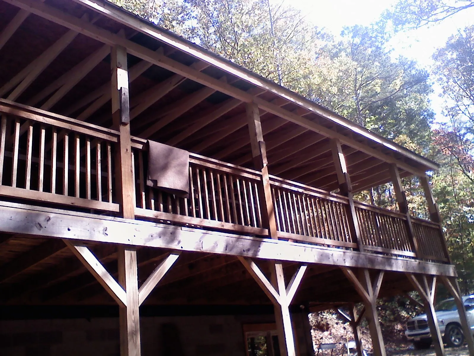Timber framing under a new elevated porch and deck — Roof Leak Repair in Goldsboro by Roofing Brothers